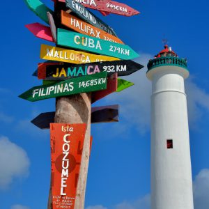 Lighthouse and Signpost at Punta Sur near San Miguel, Cozumel, Mexico - Encircle Photos