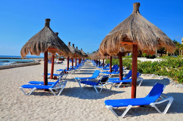 Empty Chaises Under Beach Umbrellas at Riviera Maya, Mexico - Encircle Photos