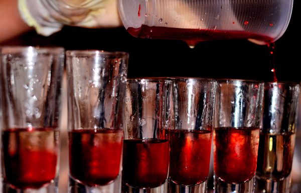 Pouring Shots to Party Hardy at Riviera Maya, Mexico - Encircle Photos