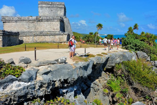 Tourists Exploring the Mayan Ruins in Tulum, Mexico - Encircle Photos
