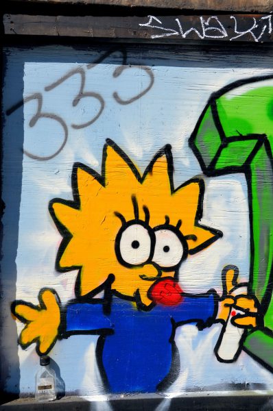 Maggie Simpson Mural and Empty Brandy Bottle in Detroit, Michigan - Encircle Photos