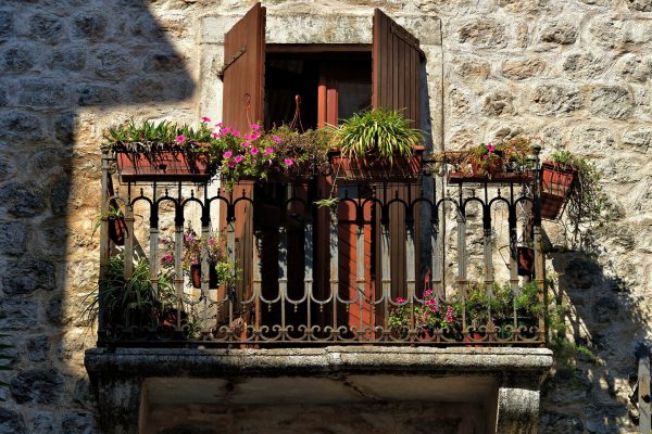 Flowerboxes on Balcony Railing in Kotor, Montenegro - Encircle Photos