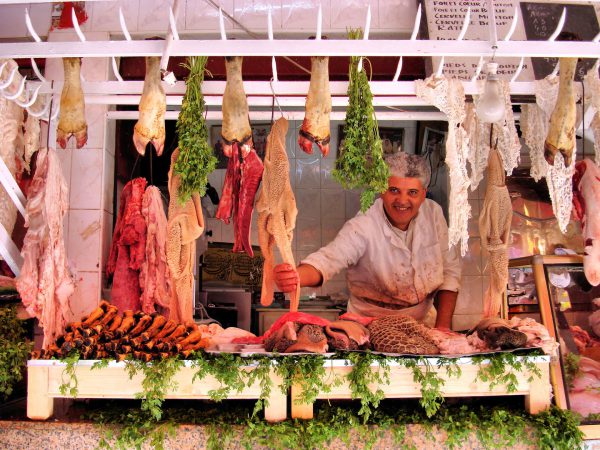 Butcher in Raw Meat Stand at Old Medina in Casablanca, Morocco - Encircle Photos