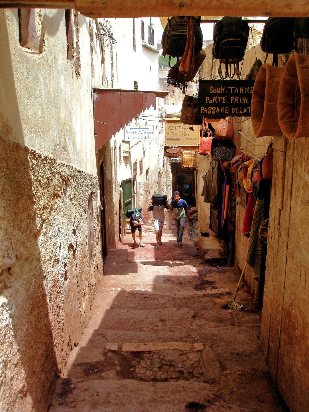 https://www.encirclephotos.com/wp-content/uploads/Morocco-Fez-Fes-El-Bali-Small-Alley-1080x1440.jpg