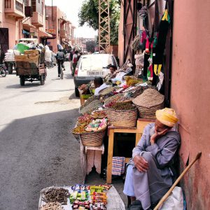Sleeping Street Vendor in Marrakech, Morocco - Encircle Photos
