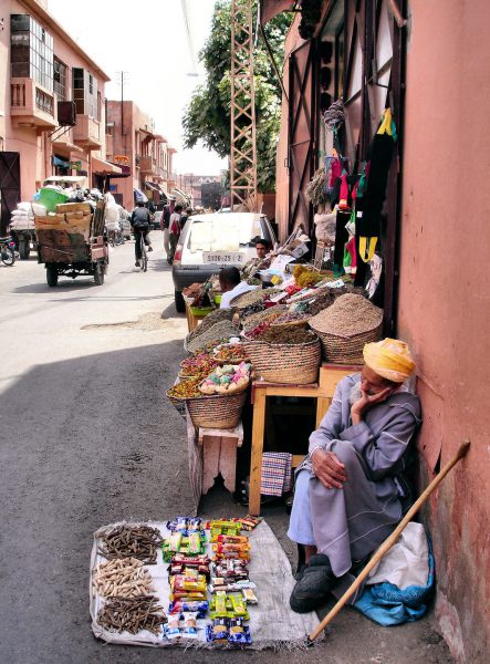 Sleeping Street Vendor in Marrakech, Morocco - Encircle Photos