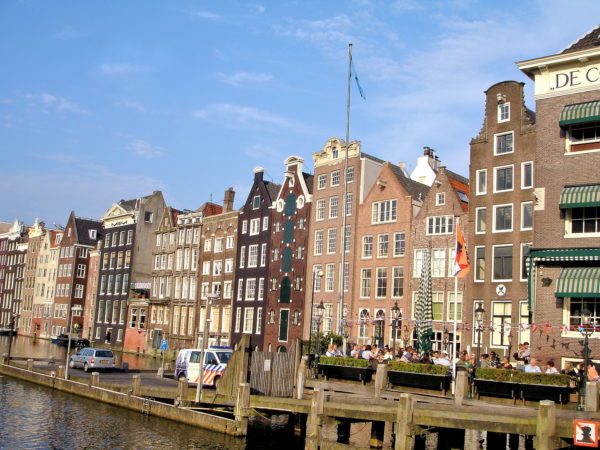 Dancing Houses on Damrak Canal in Amsterdam, Netherlands - Encircle Photos