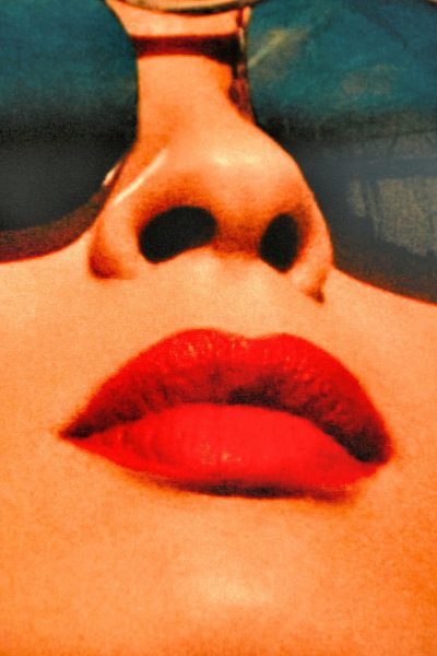 Woman Red Lips and Sunglasses from Faces on the Strip at Las Vegas, Nevada - Encircle Photos