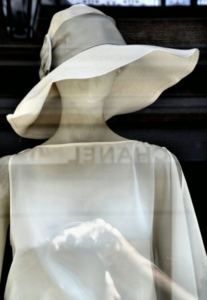 White Hat and Dress on Female Mannequin from Faces on the Strip at Las Vegas, Nevada - Encircle Photos