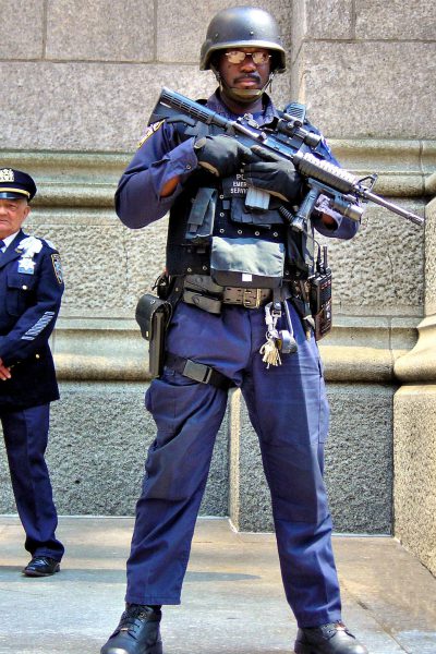 Policeman with Machine Gun in New York City, New York - Encircle Photos