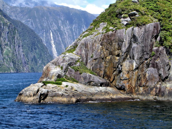 Glacier Etched Rocks in Milford Sound at Fiordland, New Zealand - Encircle Photos