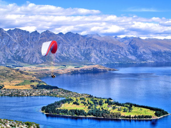 Paragliding over Lake Wakatipu in Queenstown, New Zealand - Encircle Photos