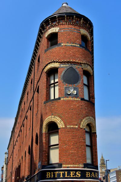 Red Brick Flatiron Building in Belfast, Northern Ireland - Encircle Photos