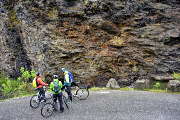 Cycling along Flåmsbana near Flåm, Norway - Encircle Photos