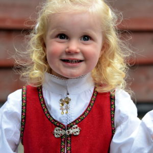 Little Girl Wearing Bunad in Flåm, Norway - Encircle Photos
