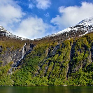 Waterfall Cascading Down Mountain at Geirangerfjord near Geiranger, Norway - Encircle Photos