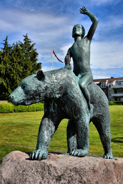 Bear with Boy Statue in Kristiansand, Norway - Encircle Photos