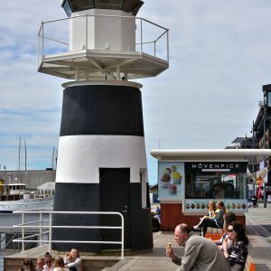 Lighthouse along Strandon at Aker Brygge in Oslo, Norway - Encircle Photos