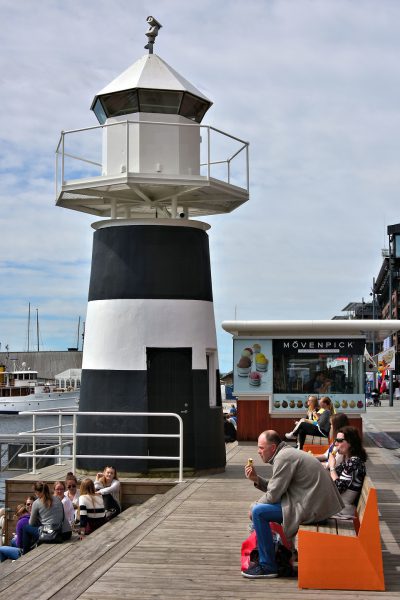 Lighthouse along Strandon at Aker Brygge in Oslo, Norway - Encircle Photos