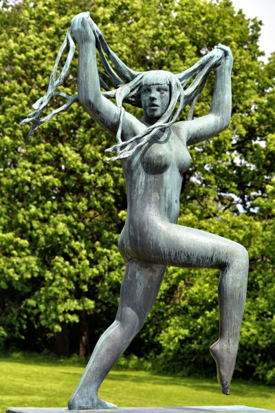 Dancing Woman Pulling Hair Statue at Frogner Park in Oslo, Norway - Encircle Photos