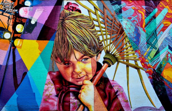Young Girl with Umbrella Mural by Higher Level Art in Cincinnati, Ohio - Encircle Photos