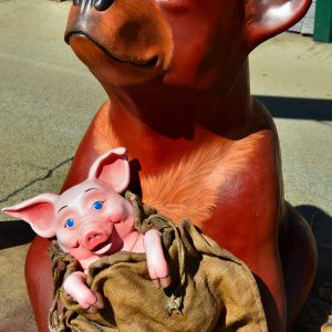 Bear Holding Pig Statue from BearFest in Grants Pass, Oregon - Encircle Photos
