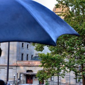 Allow Me Umbrella Man Statue in Portland, Oregon - Encircle Photos
