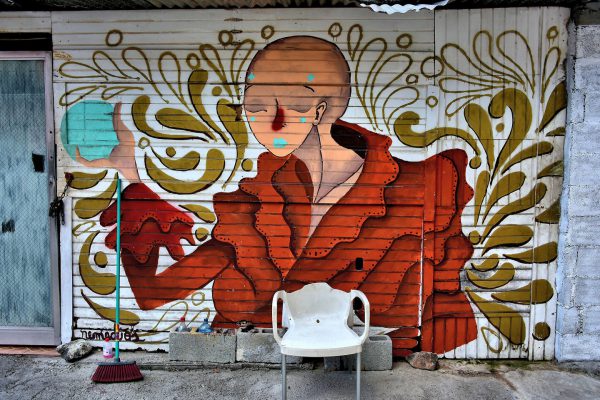 Bald Woman with Blue Lips Mural in Casco Viejo, Panama City, Panama - Encircle Photos