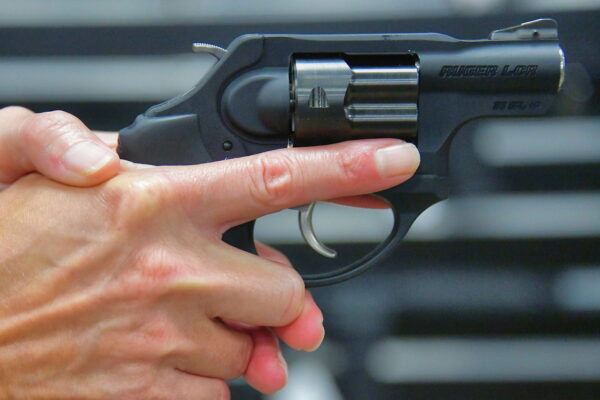 Chapter 22: Holding Snub-nosed Ruger Revolver in Philadelphia, Pennsylvania - Encircle Photos