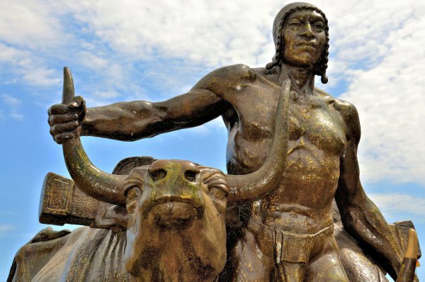 Indigenous Farmer with Oxen Statue in Lima, Peru - Encircle Photos