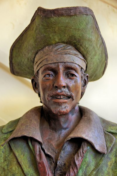 Camille Pissarro Statue at Pirates Gallery in Charlotte Amalie, Saint Thomas - Encircle Photos