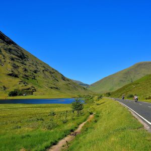 Motorcyclists Driving in Glen Coe in Scottish Highlands, Scotland - Encircle Photos