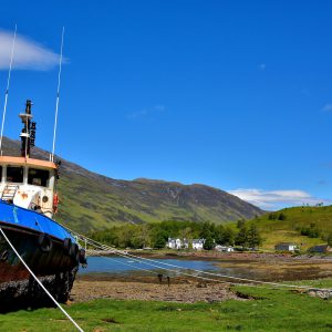 Beached Tugboat on Loch Duich in Scottish Highlands, Scotland - Encircle Photos