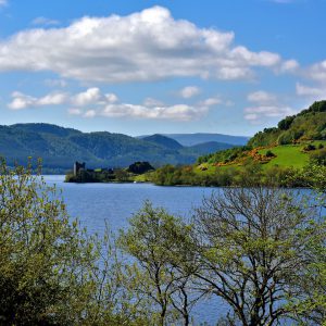 Distant View of Urquhart Castle on Loch Ness in Scottish Highlands, Scotland - Encircle Photos