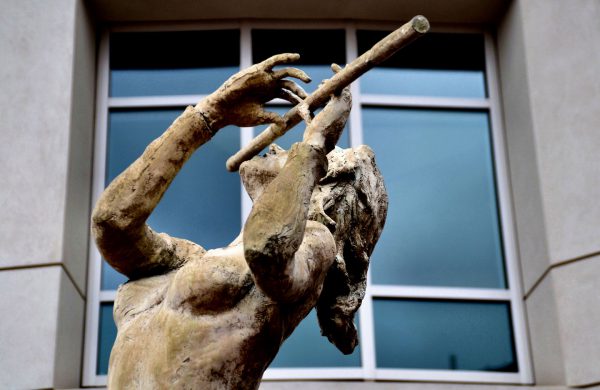 Meditation Statue of Woman Playing Flute by Tuan Nguyen in Greenville, South Carolina - Encircle Photos