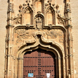 Reliefs on Monastery of Santa Isabel la Real in Albaicín District of Granada, Spain - Encircle Photos