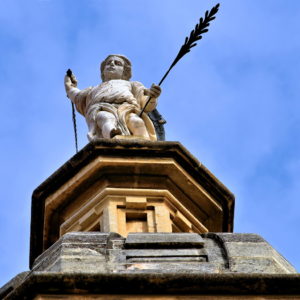 Archangel Statue atop Granada Cathedral in Granada, Spain - Encircle Photos