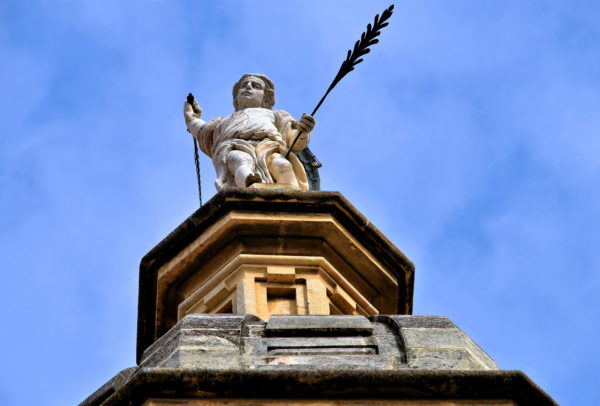 Archangel Statue atop Granada Cathedral in Granada, Spain - Encircle Photos