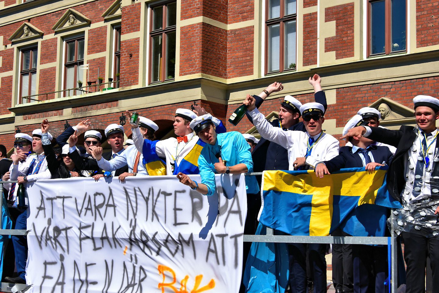 Teen Boys Celebrating in Dump Truck in Malmö, Sweden - Encircle Photos