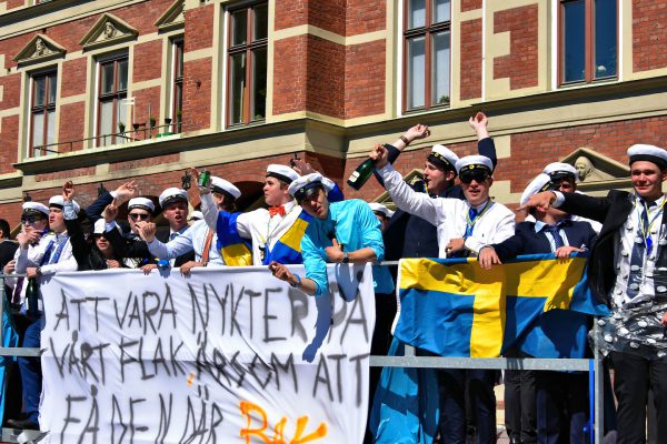 Teen Boys Celebrating in Dump Truck in Malmö, Sweden - Encircle Photos