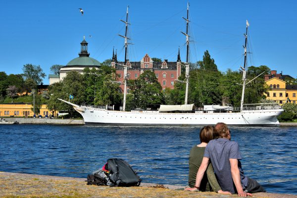 Romantic Couple Admiring af Chapman Ship in Stockholm, Sweden - Encircle Photos