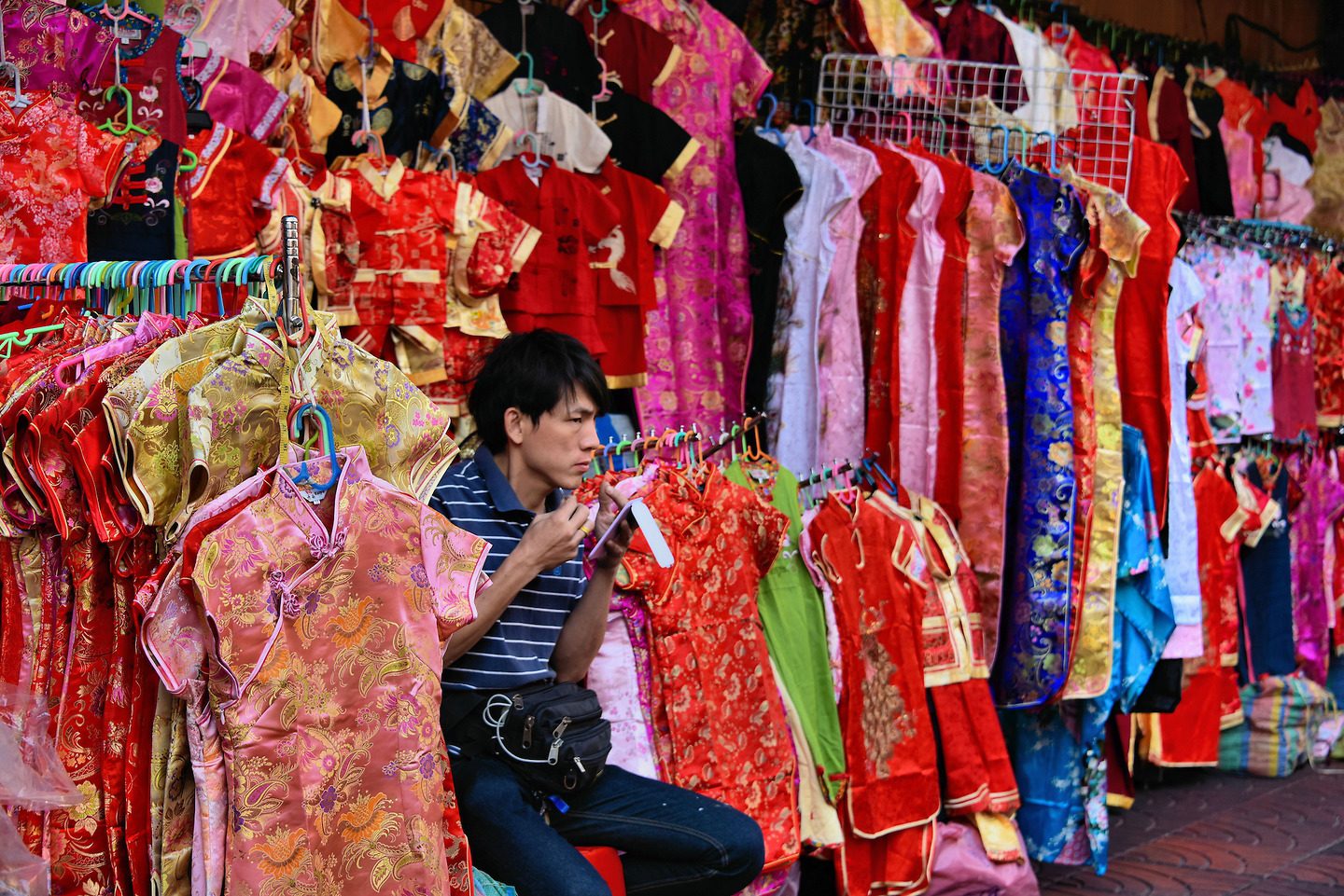Racks of Women’s Silk Clothes in Chinatown in Bangkok, Thailand