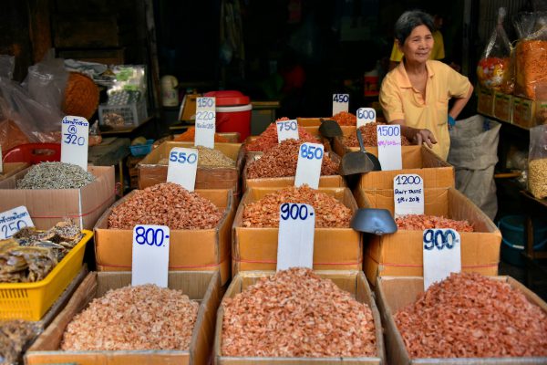 Woman Selling Shrimp in Chinatown in Bangkok, Thailand - Encircle Photos