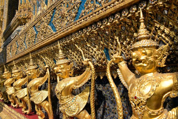 Row of Golden Garudas at Grand Palace in Bangkok, Thailand - Encircle Photos