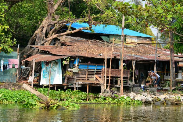 Rickety Hut on Canal in Bangkok, Thailand - Encircle Photos