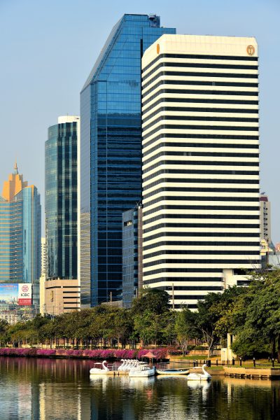 Skyscrapers along Benjakitti Park Lake in Bangkok, Thailand - Encircle Photos