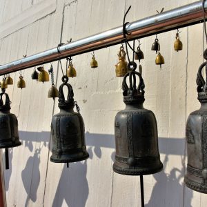 Row of Temple Bells at Wat Saket in Bangkok, Thailand - Encircle Photos