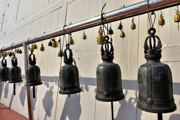 Row of Temple Bells at Wat Saket in Bangkok, Thailand - Encircle Photos