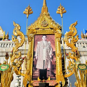 King Rama IX Portrait at Wat Traimit in Bangkok, Thailand - Encircle Photos