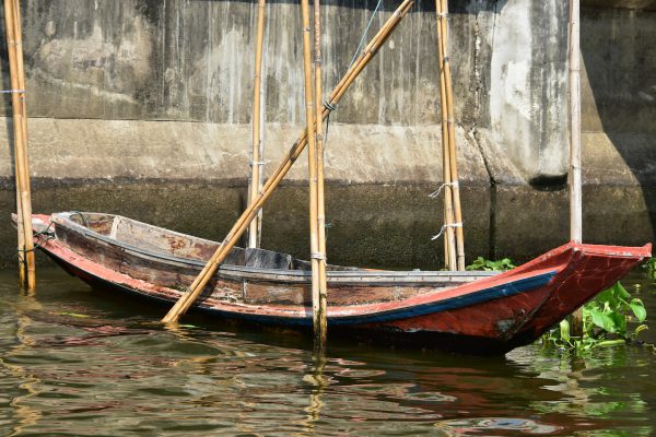 Wood Canal Boat Tied To Bamboo Stalks in Bangkok, Thailand - Encircle Photos